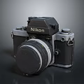Vintage Nikon SLR Camera With Classic Black Silver Body And Lens Cap