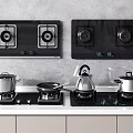 Modern Kitchen With Black Gas Hobs And Cookware On White Countertop And Cabinets