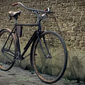 Classic Vintage Bicycle Leaning Against Old Brick Wall On Cobblestone Path 3d model