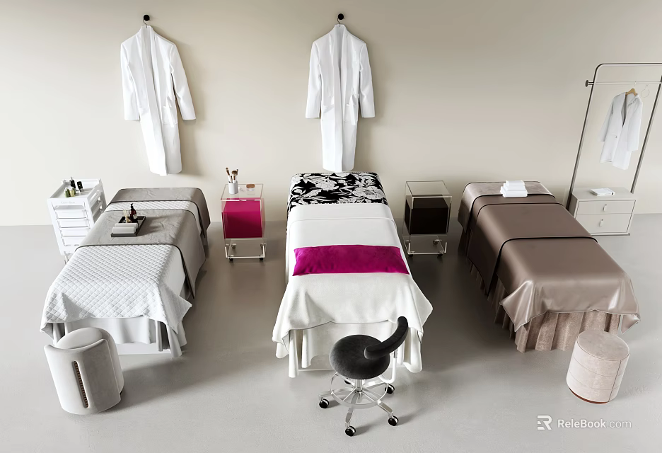Spa Treatment Room With Three Massage Tables White Robes And Colored Bed Sheets 3d model 