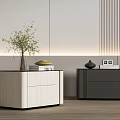 Light And Dark Bedside Tables With Vase Green Plant Books And Decorative Items