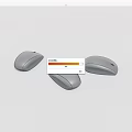 Three Gray Wireless Mice Featuring Modern Ergonomic Design For Desktop Computers