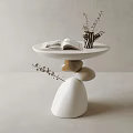 Modern Round Table With Stone Shaped Base White Tabletop Open Book And Vase