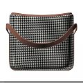 Black and White Houndstooth Stool With Brown Leather Top On Wooden Floor