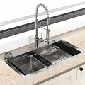 Stainless Steel Kitchen Sink With Pull Down Faucet On Beige Countertop And Cabinets