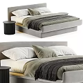 Modern Double Bed With Upholstered Headboard Cozy Blanket Pillows And Nightstand