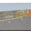Various Construction Barriers With Yellow Orange And Striped Designs On Gravel Ground