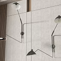 Modern Sleek Wall Lamps Mounted On Neutral Wall With Metal Arm And Green Leaves