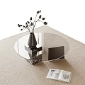 Modern Glass Top Coffee Table With Black Vase And Open Magazine On Rug
