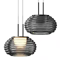 Modern Ribbed Glass Pendant Light With Illuminated Warm Glow And Sleek Metal Frame