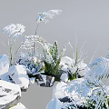 Snow Covered Natural Garden Scene With Green Ferns And Icy Rocks