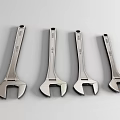 Professional Hardware Tools Shiny Steel Adjustable Wrenches Four Pieces Neatly Placed on Grey Surface
