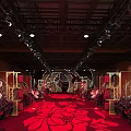 Service Hall Interior With Red Carpet Floral Decorations Golden Frames And Ceiling Lighting