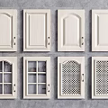 White Cabinet Doors With Various Panel Designs And Glass Lattice Details