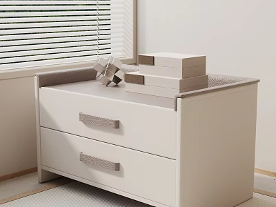 White Bedside Table With Two Drawers Fabric Handles And Stacked Boxes Decor 3d model