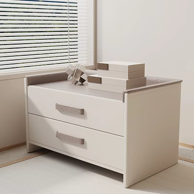 White Bedside Table With Two Drawers Fabric Handles And Stacked Boxes Decor 3d model