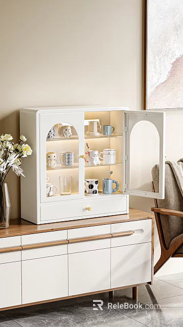 Decorative Ornaments Set Displayed in Open White Cabinet with Arched Doors Mugs and Glass Cups 3d model 