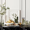 Elegant Decorative Ornament Set With Olive Branches Oranges Glass Vases Picture Frame On Marble Countertop