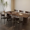 Dining Room Setup With Long Wooden Table Six Black Chairs And Potted Plant