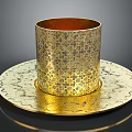 Golden Decorative Cup With Intricate Patterns On Matching Saucer For Home Use