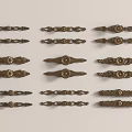 Ornate Metal Cabinet Handles Featuring Various Intricate Designs and Patterns