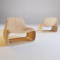 Two Woven Outdoor Chairs With Modern Sleek Design And Comfortable Seating For Garden