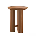 Two Wooden Side Tables With Round Tops And Cylindrical Legs Design