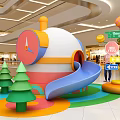 Indoor Children's Playground In Mall With Colorful Slide Kids Playing And Decorative Trees