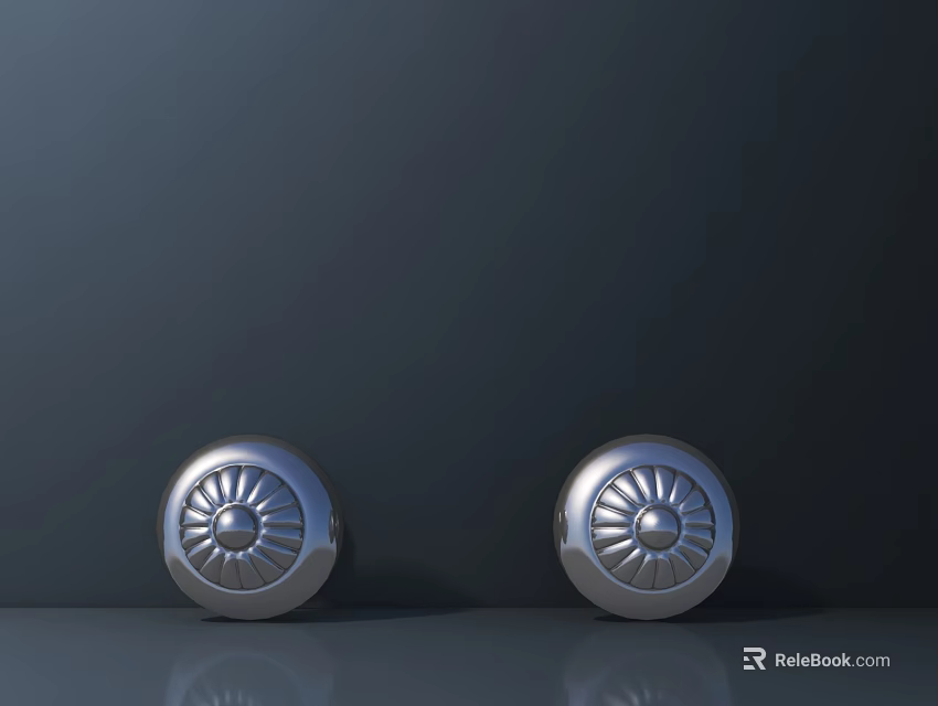 Two Shiny Metallic Silver Tires with Pattern Design on Dark Background Surface 3d model 
