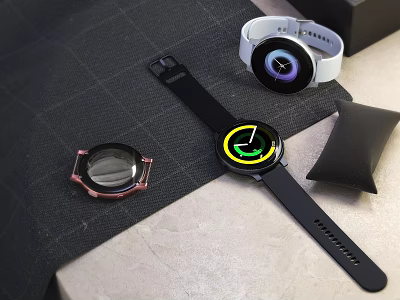 Smart Watches With Black White Straps Green Purple Dials And Case Parts On Desk 3d model