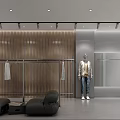Modern Fashion Clothing Store Interior With Mannequins Hanging Apparel And Display Racks