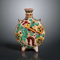 Sculptural Ceramic Vase With Colorful Carved Floral Motifs And Decorative Figure On Tripod Base