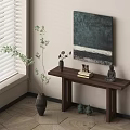 Modern Console Table with Green Plant Wall Art Books Buddha Statue and Brass Figurines