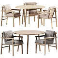 Round Wooden Dining Table With Upholstered Chairs And Light Wood Frame Design