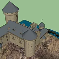 Ancient Castle Architecture With Towered Spires Perched On Hill Surrounded By Trees And Water
