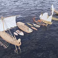 Traditional Wooden Boats With White Sails Sailing On Calm Blue Water