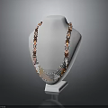 Fashionable Layered Necklace with Orange Black Geometric Pattern Displayed on White Mannequin Stand