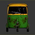 Vintage Auto Rickshaw With Yellow Green Body And Rusty Seats Windows