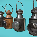 Vintage Multiple Candle Lanterns in Black and Brown With Handles on Light Blue Background