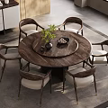 Modern Restaurant Interior With Round Wooden Dining Table Chairs Green Plant And Decorative Items