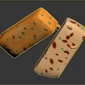 Two Delicious Pastry Pieces With Colorful Red Green Yellow Bits Falling