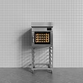 Stainless Steel Kitchen Oven with Metal Stand and Wheels Against White Tiled Wall