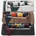 Brown Velvet Two Seater Sofa With Colorful Pillows And Dark Blue Blanket