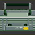 Vintage Computer Device With Green And White Block Design Top Handle Buttons And Yellow Detail