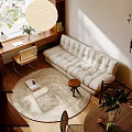 Elegant Apartment Living Room With Tufted Sofa Round Woven Rug And Pendant Light