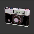Vintage Electronic Camera With Classic Black White Body And Lens Design