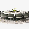 Round Dining Table Set With Green Chairs White Tablecloth And Floral Centerpiece On Circular Rug