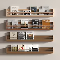 Wooden Wall Mounted Layered Bookshelves With Decorative Books And Minimalist Neutral Design