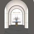 Modern Entryway Featuring Arched Design Circular Pendant Light Marble Top Table Blue Vase White Flowers