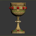 Ornate Golden Wine Goblet With Red Green Gemstones And Intricate Carved Design